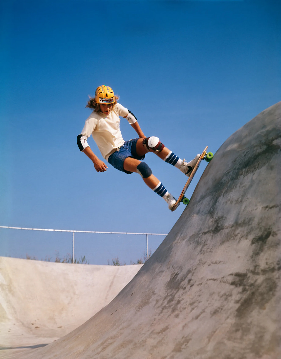 boy skating with knee pads