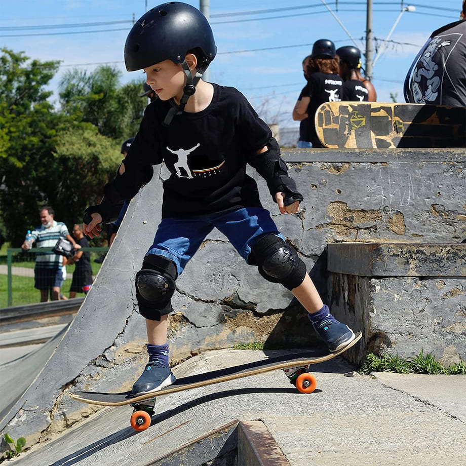 little child wearing skate protective essentials